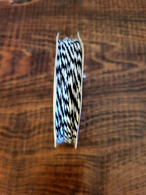 Ghost garland. Share NOW. #ghosts, #Halloween, #garland, #dollartree, #craft